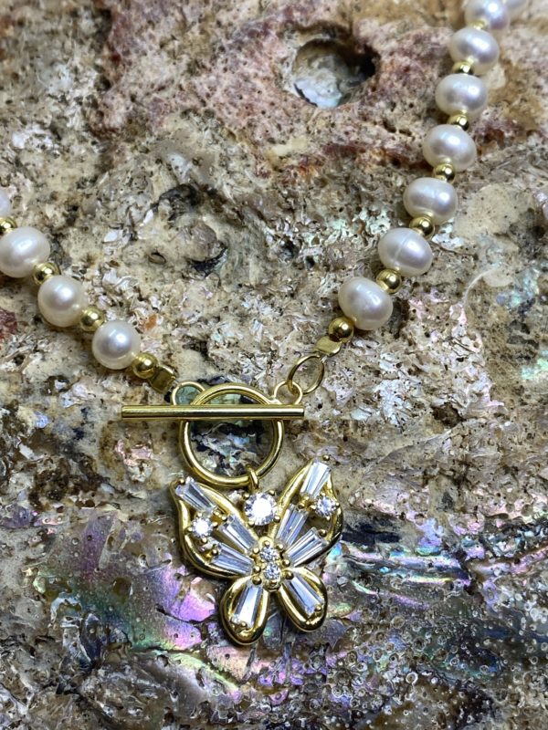 Close-up of Butterfly Bliss Freshwater Pearl Necklace with freshwater pearls