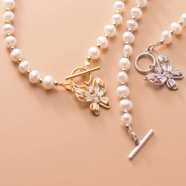 Close-up of Butterfly Bliss Freshwater Pearl Necklace clasp with 14k gold over sterling silver beads" 