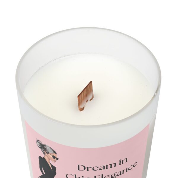 Close-up of a frosted glass candle with a crackling wooden wick. Hand-poured coconut soy wax for a clean-burning, eco-friendly home fragrance experience.