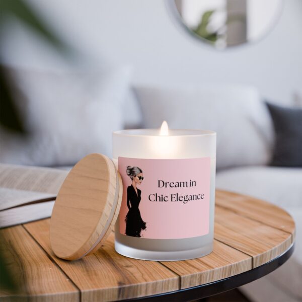 Luxury frosted glass candle with a crackling wooden wick, burning elegantly on a wooden table. Clean-burning coconut soy wax for a cozy home ambiance.