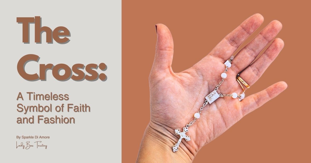 Hand holding a silver cross rosary, symbolizing faith and fashion
