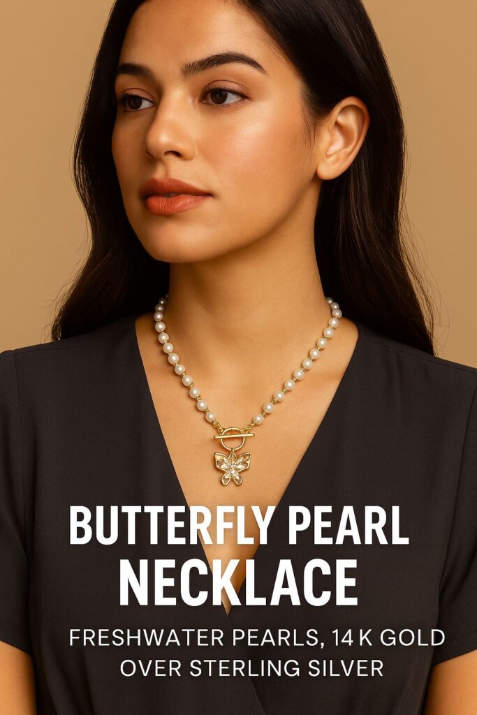 Woman wearing a butterfly pearl necklace made of freshwater pearls and gold, symbolizing transformation, grace, and feminine power.