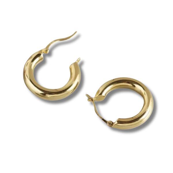 Angled view of 18k gold-plated sterling silver 20mm hoop earrings showing polished finish and secure lever-back clasp.