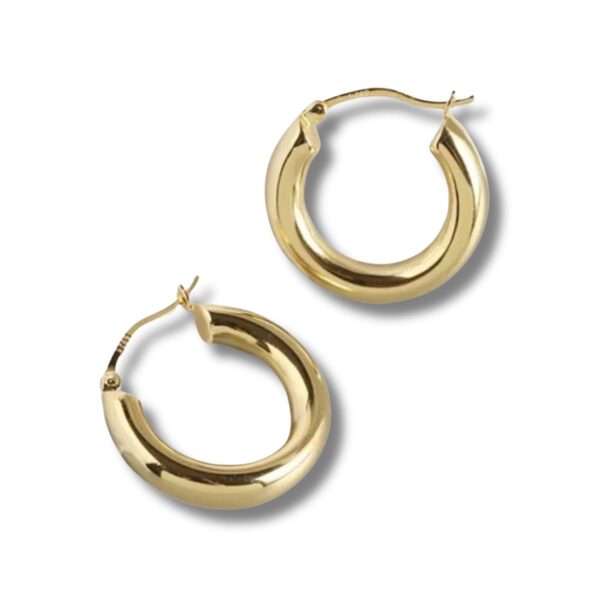 Chunky 18k gold-plated sterling silver huggie hoop earrings, 20mm thick minimalist design with smooth polished gold finish on white background.