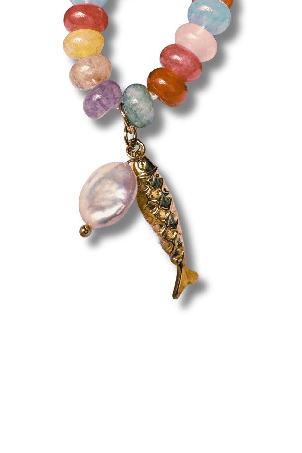 gold fish pendant with pearl charm and colorful gemstone beads close up boho necklace detail